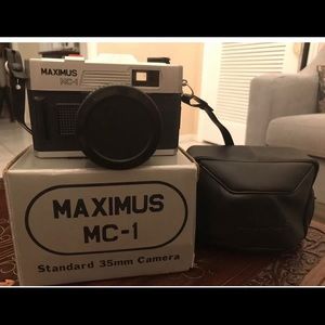 Maximus MC-1 50mm Lens And 1/125 Shutter With Case And Box.